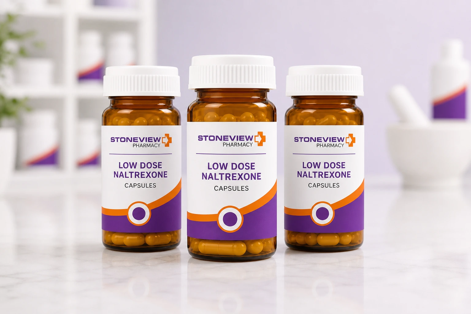 Three Stoneview branded low dose naltrexone capsule bottles